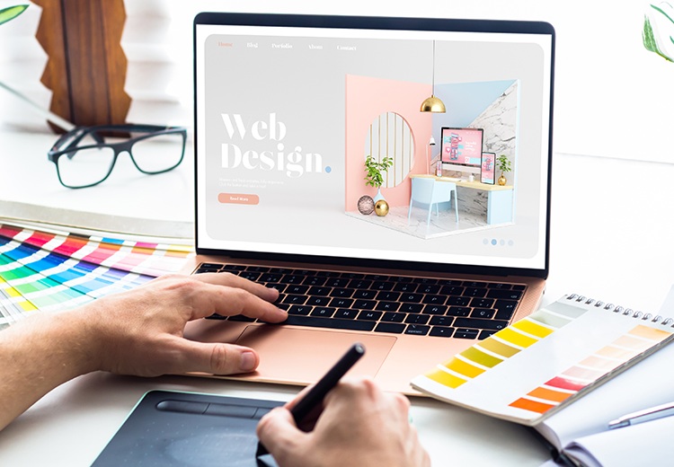 Web design mockup with laptop and color swatches.